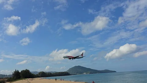 Plane is flying over the ocean Stock Footage 304330932