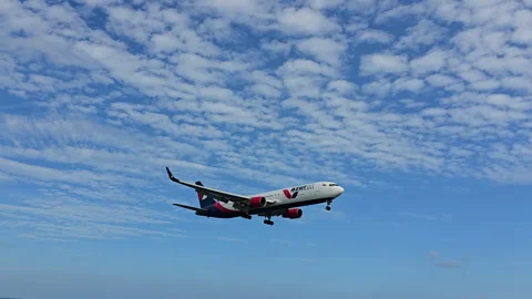 Plane is flying over the ocean Stock Footage 304331242