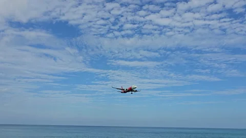 Plane is flying over the ocean Stock Footage 304331405