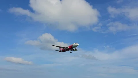 Plane is flying over the ocean Video stock 304409458