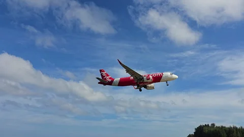 Plane is flying over the ocean Stock Footage 304410359