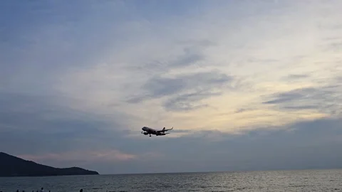 Plane is flying over the ocean Stock Footage 304410818