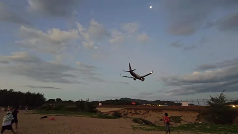 Plane is flying over the ocean Stock Footage 304412632