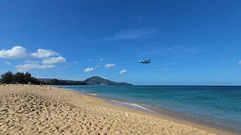 Plane is flying over the ocean Stock Footage 304412662