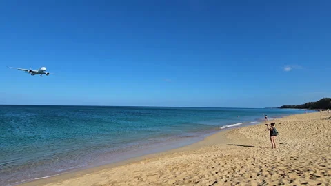 Plane is flying over the ocean Stock Footage 304412948