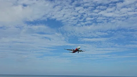 Plane is flying over the ocean Stock Footage 304416474