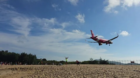 Plane is flying over the ocean Stock Footage 304420560