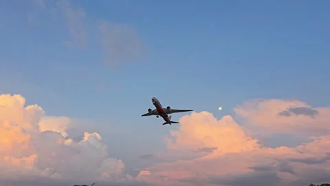 Plane is flying over the ocean Stock Footage 304423781