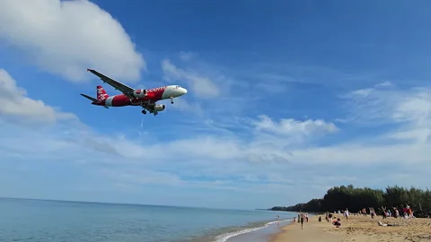 Plane is flying over the ocean Stock Footage 304425001