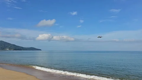 Plane is flying over the ocean Stock Footage 304425414