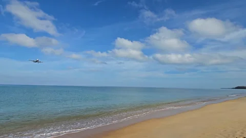 Plane is flying over the ocean Stock Footage 304425491