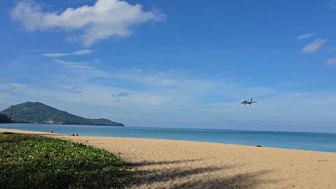 Plane is flying over the ocean Stock Footage 304425780