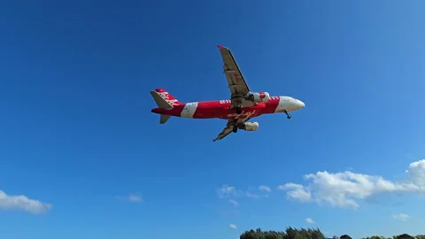 Plane is flying over the ocean Video stock 304427057