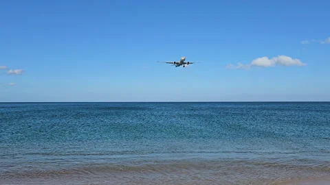 Plane is flying over the ocean Stock Footage 304427622