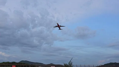 Plane is flying over the ocean Stock Footage 305040974