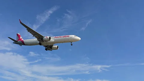 Plane is flying over the ocean Stock Footage 305043752