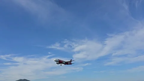 Plane is flying over the ocean Stock Footage 305044116