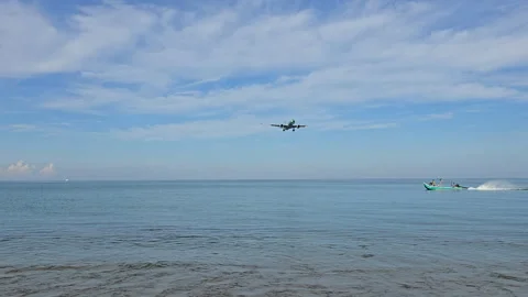 Plane is flying over the ocean Stock Footage 305047192