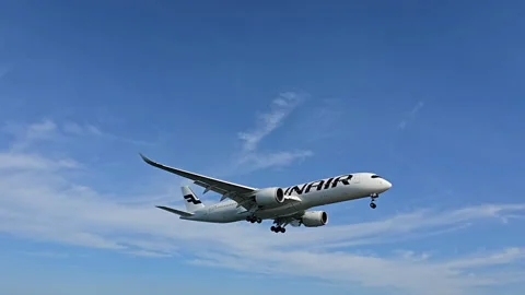Plane is flying over the ocean Stock Footage 305049044