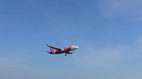 Plane is flying over the ocean Stock Footage 305054170