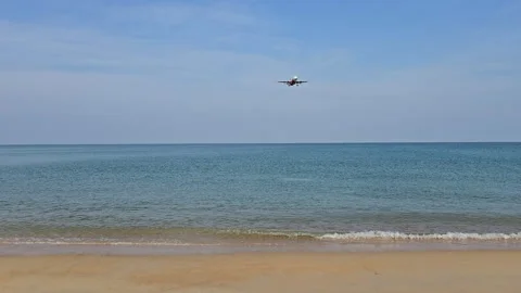 Plane is flying over the ocean Stock Footage 305056865