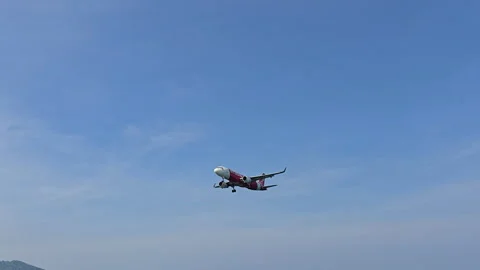 Plane is flying over the ocean Stock Footage 305058650