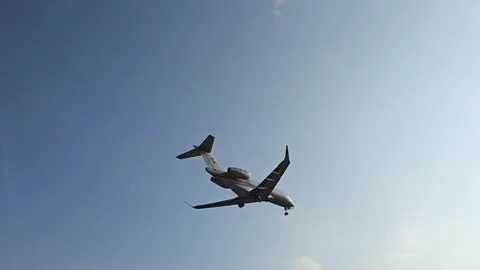 Plane is flying over the ocean Stock Footage 305059828