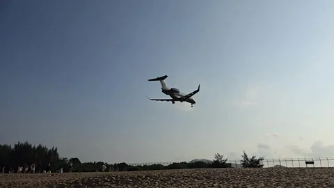 Plane is flying over the ocean Stock Footage 305060573