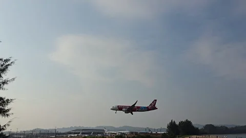 Plane is flying over the ocean Stock Footage 305065474