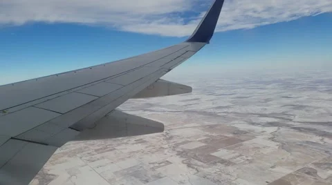 Plane Flying Over Snowy Fields Stock Footage 47453493