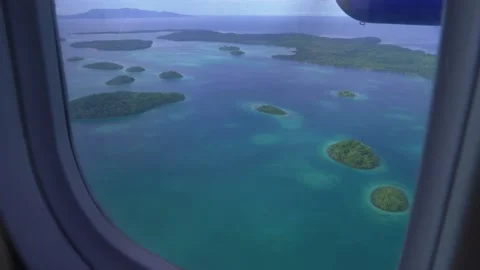 Plane flying over Solomon Islands, Stock Video Pond5