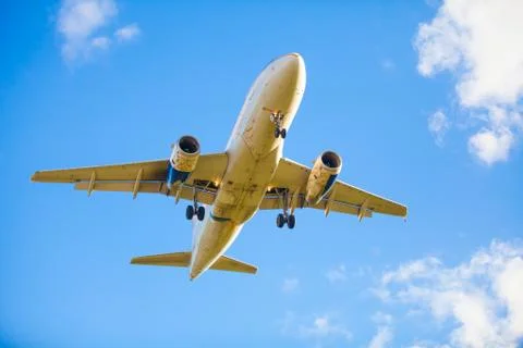 Plane flying Stock Photos