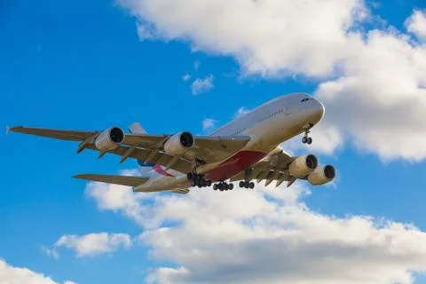Plane flying Stock Photos