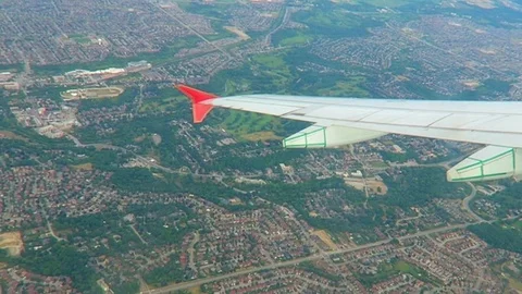 Plane flying side ways Stock Footage 75654758