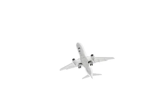 The plane flying in the sky a close up the bottom view Stock Photos