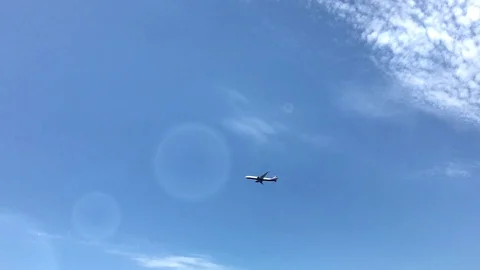 A plane flying in the sky Stock Footage 129507560