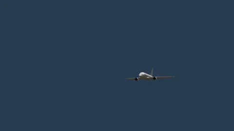 Plane flying on sky video Stock Footage 307821188