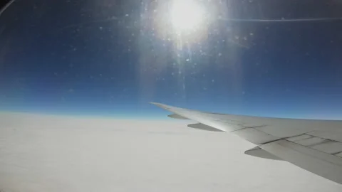 Plane flying smoothly in the sunshine Stock-Footage 146314625