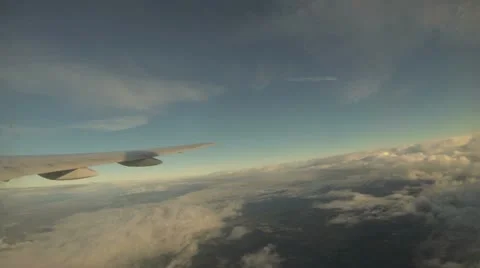 Plane Flying Through Clouds Stock Footage 12721940