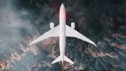 Plane flying through clouds at high altitude, top down view Stock Footage 185939697