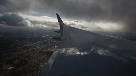 Plane Flying Through Clouds - Wing View Video stock 58911762