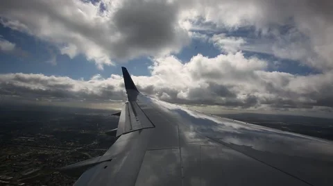 Plane Flying Through Clouds - Wing View 2 Video stock 58912081