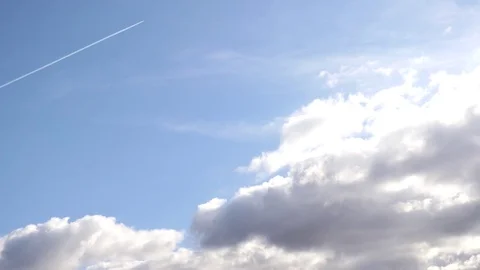 Plane flying through the sky Stock Footage 74604522