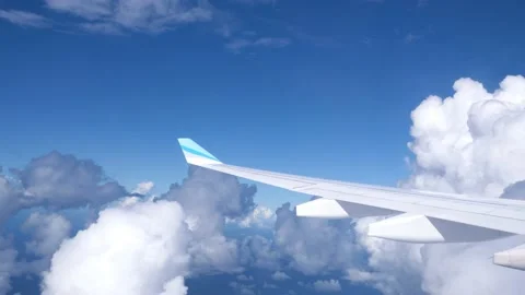 Plane flying through white cloud Stock Footage 230147870