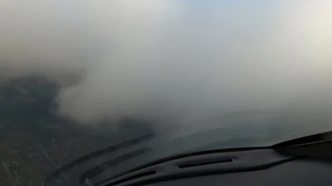 Plane is flying throuh the clouds Stock Footage 154176501