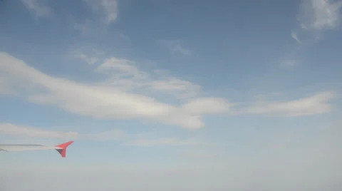 Plane flying, wing and clouds Video stock 22781035