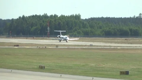 The plane is gaining speed on the runway Stock Footage 116258384