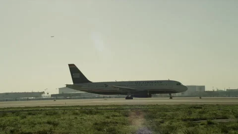 Plane getting ready to take off on runway Stock Footage 197493287