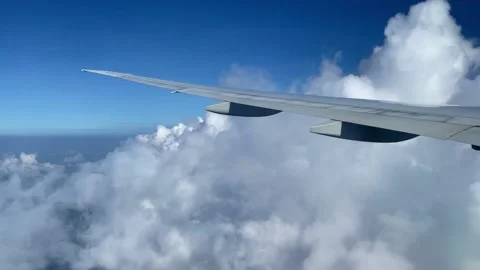 Plane goes close to clouds. View from the plane to the clouds. Stock Footage 163369093