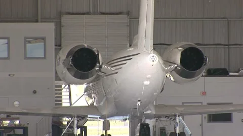 Plane in hangar Stock Footage 7136296